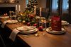 Marnka & Co. Maka Blend on a Christmas dinner table with candles and native flowers