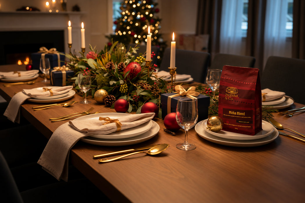 Marnka & Co. Maka Blend on a Christmas dinner table with candles and native flowers