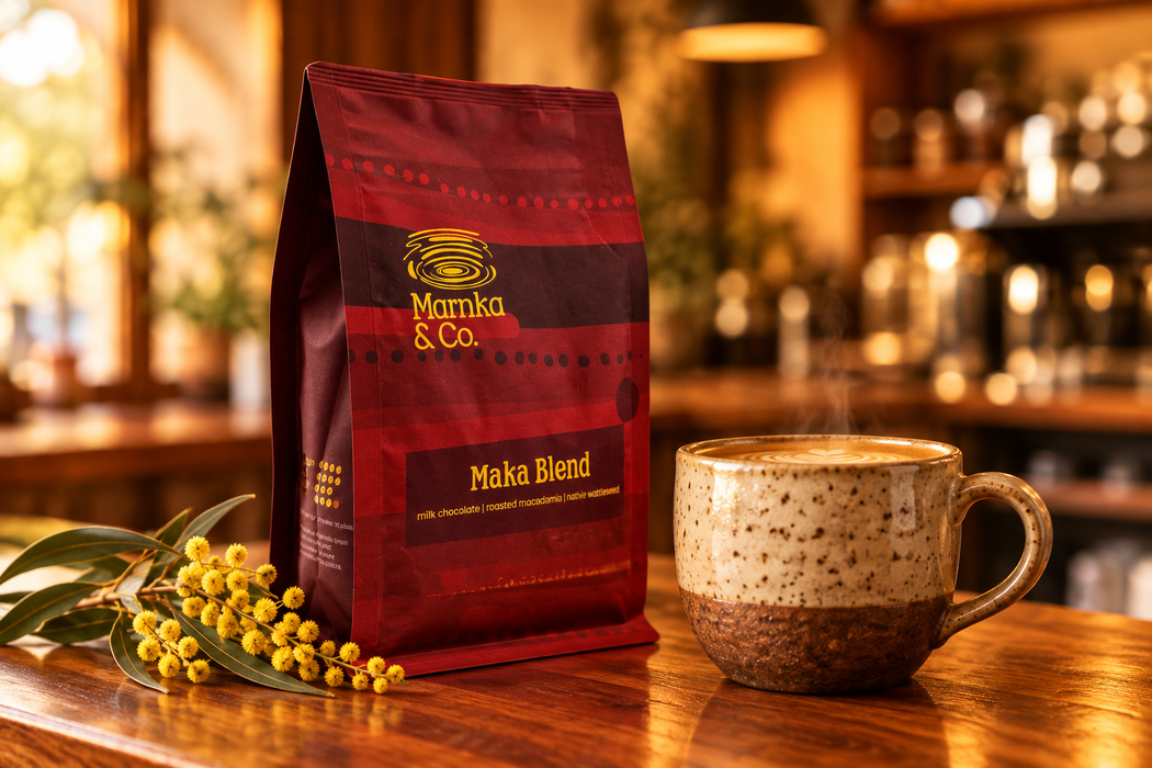 Marnka & Co. Maka Blend bag beside a latte on a café counter with golden wattle